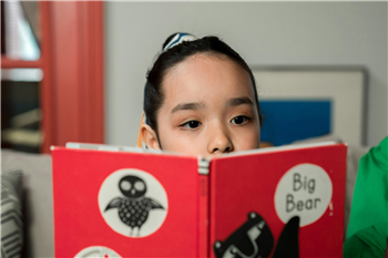 Child with book