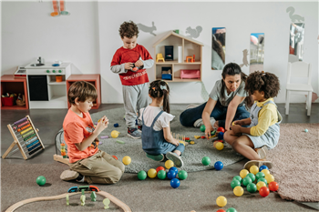 Teacher with children