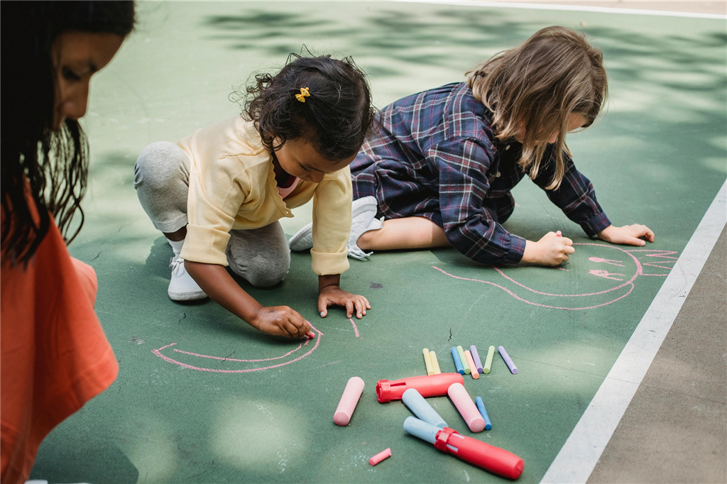 Children with outdoor chalk
