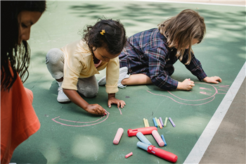 Children with outdoor chalk